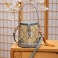 Song_Brocade_Fragrant_Cloud_Silk_Bucket_Bag_-_SinoCultural-2483108