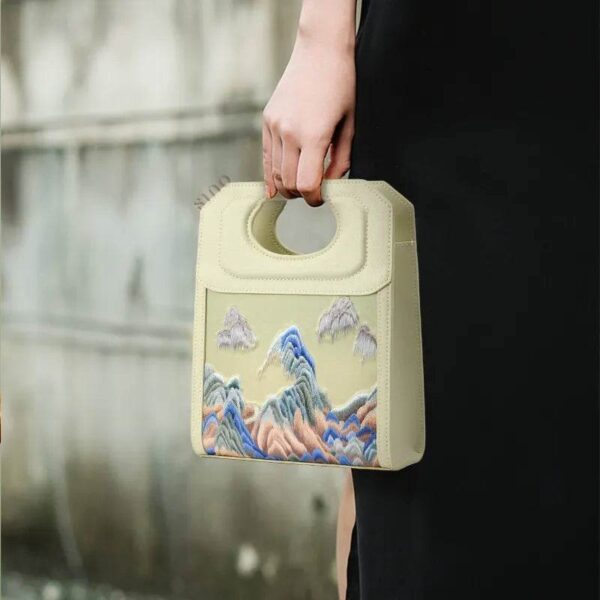 chinoiserie-mountains-embroidered-handle-bag-model-2 chinoiserie-mountains-embroidered-handle-bag-model-2
