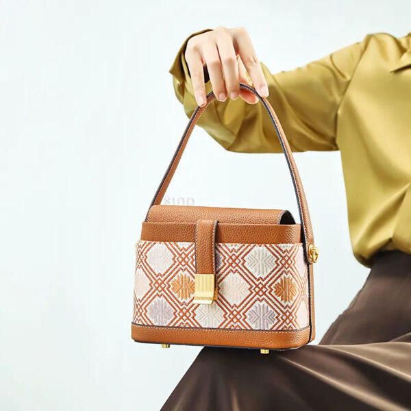 model-seated-brocade-bag-on-knees model-seated-brocade-bag-on-knees