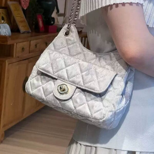 model-wearing-chinoiserie-gold-brocade-crossbody-bag model-wearing-chinoiserie-gold-brocade-crossbody-bag