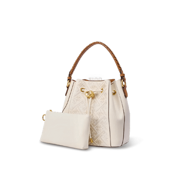 wanj-pattern-embroidered-leather-convertible-backpack-tote-side-view wanj-pattern-embroidered-leather-convertible-backpack-tote-side-view